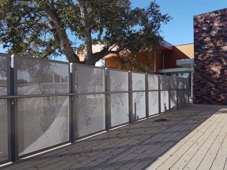 Manning community centre perforated fence child care centre